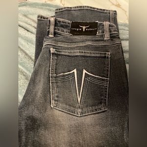 Sergio Valente blue jeans with white stitching